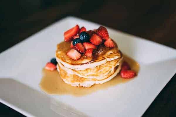 strawberry blueberry maple pancake stack
